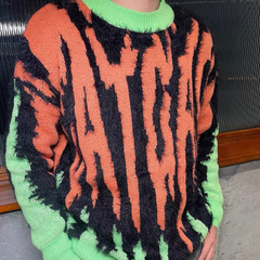 Suéter con fuente de llamas