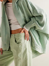 Cárdigan con capucha, mangas murciélago y frente abierto con costura expuesta