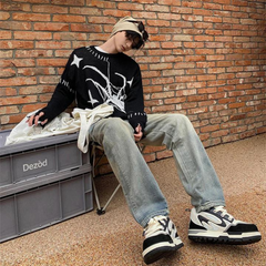 Suéter de jacquard con estrellas y araña de High Street