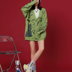 Süße Baby-Drachen-Strickjacke