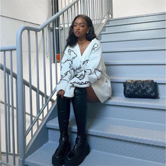 Cárdigan con estampado de dinosaurio