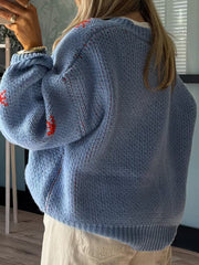Pullover mit Rundhalsausschnitt und überschnittenen Schultern und Stiefelmuster