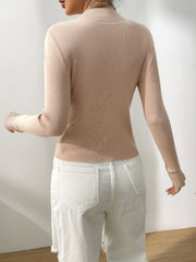 Suéter de manga larga con cuello alto y detalle de encaje