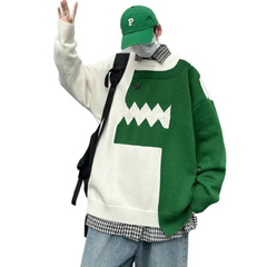 Suéter de dinosaurio con patchwork