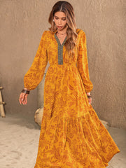 Vestido estampado con mangas abullonadas y muescas