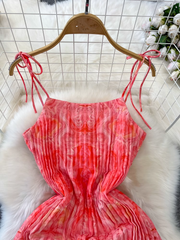 Vestido playero de estilo resort costero, largo medio, corte A, plisado, estampado, con tirantes