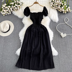 Vestido estilo A con escote cuadrado, abertura y manga corta con lazo y burbujas