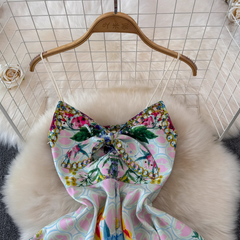 Vestido playero con tirantes y estampado floral colorido