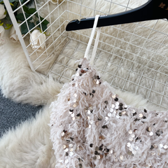 Paillettenkleid mit pelzigen Fransen