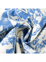 Sommerkleid mit Blumenmuster und Urlaubsmotiv