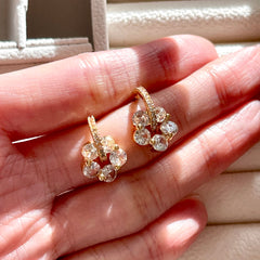 Ohrringe mit Sakura-Blume und Kirschblüte, goldfarben