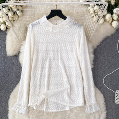 Conjunto de dos piezas formado por una blusa de gasa con encaje y un vestido tipo chaleco de punto holgado