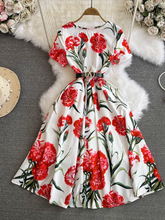 Kurzärmliges, mittellanges, bedrucktes Puffkleid mit Rundhalsausschnitt in A-Linie