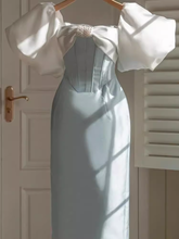 Kleid mit Puffärmeln und kontrastierender Schleife an der Taille