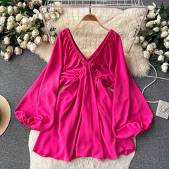 Vestido de vacaciones con escote en V profundo y mangas largas tipo farol