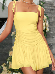 A Sleeveless Pleated And Cinched Short Dress