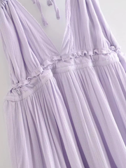 Rückenfreies Neckholder-Kleid mit tiefem Ausschnitt und Strapsen aus Netzstoff