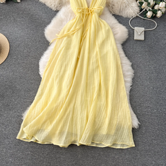 Vestido largo sin mangas con escote en V profundo