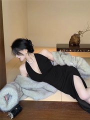 Schwarzes rückenfreies Neckholderkleid mit Schlitz für Damen