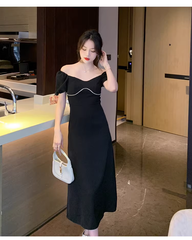 Schwarzes Kleid im Retro-Design mit Puffärmeln