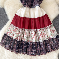 Retro Sling-Kleid mit kontrastfarbenen Nähten und Blumenmuster