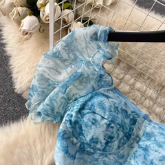 Kleid mit Puffärmeln und Blumenmuster