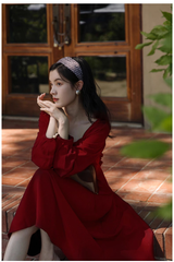 Rotes Retro-Kleid mit Dreiviertelärmeln