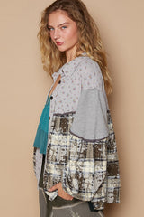 Camisa a cuadros con bloques de colores y flores y mangas abullonadas