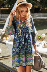 Böhmisches Kleid mit Ballonärmeln und Bindeband am Hals