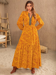 Vestido estampado con mangas abullonadas y muescas