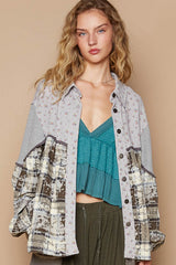 Camisa a cuadros con bloques de colores y flores y mangas abullonadas
