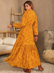 Vestido estampado con mangas abullonadas y muescas