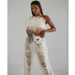 Pantalones deshilachados de punto desgastado