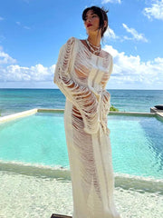 Vestido playero sin espalda y con flecos