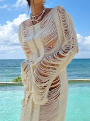 Vestido playero sin espalda y con flecos