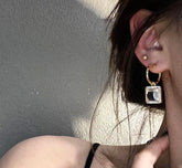 Pendientes de barra de caramelo dorada