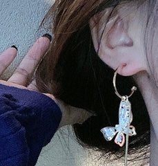 Colgante de mariposa desigual