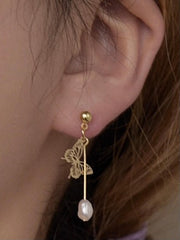 Pendientes llamativos de mariposa con encaje dorado