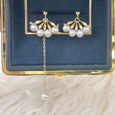 Mismatched fan shaped earrings