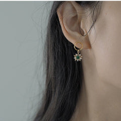 Pendientes de estrella dorada de color verde esmeralda hechos a mano