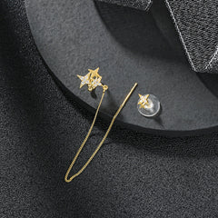 Pendientes de puño con estrella del norte dorada