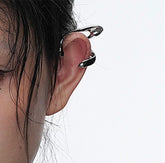 Puño de oreja en forma de hélice