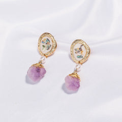 Pendientes de cristal morado en bruto hechos a mano
