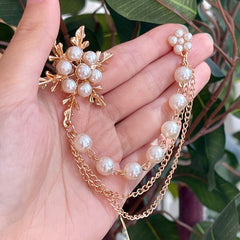 Broche de copo de nieve dorado