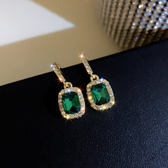 Pendientes de encaje dorado de color verde esmeralda