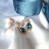 Teardrop blue sapphire earrings