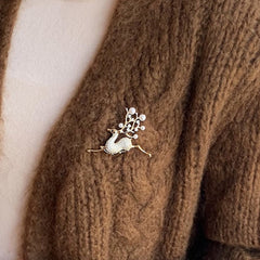 Delicado broche de reno