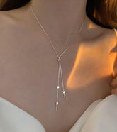 Halskette mit Quaste und Lassoanhänger