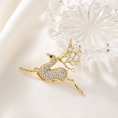 Delicado broche de reno