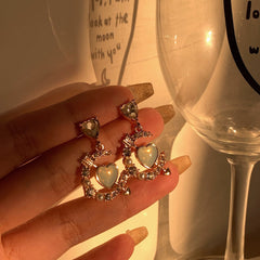 Pendientes kawaii de Sailor Moon en color azul bebé